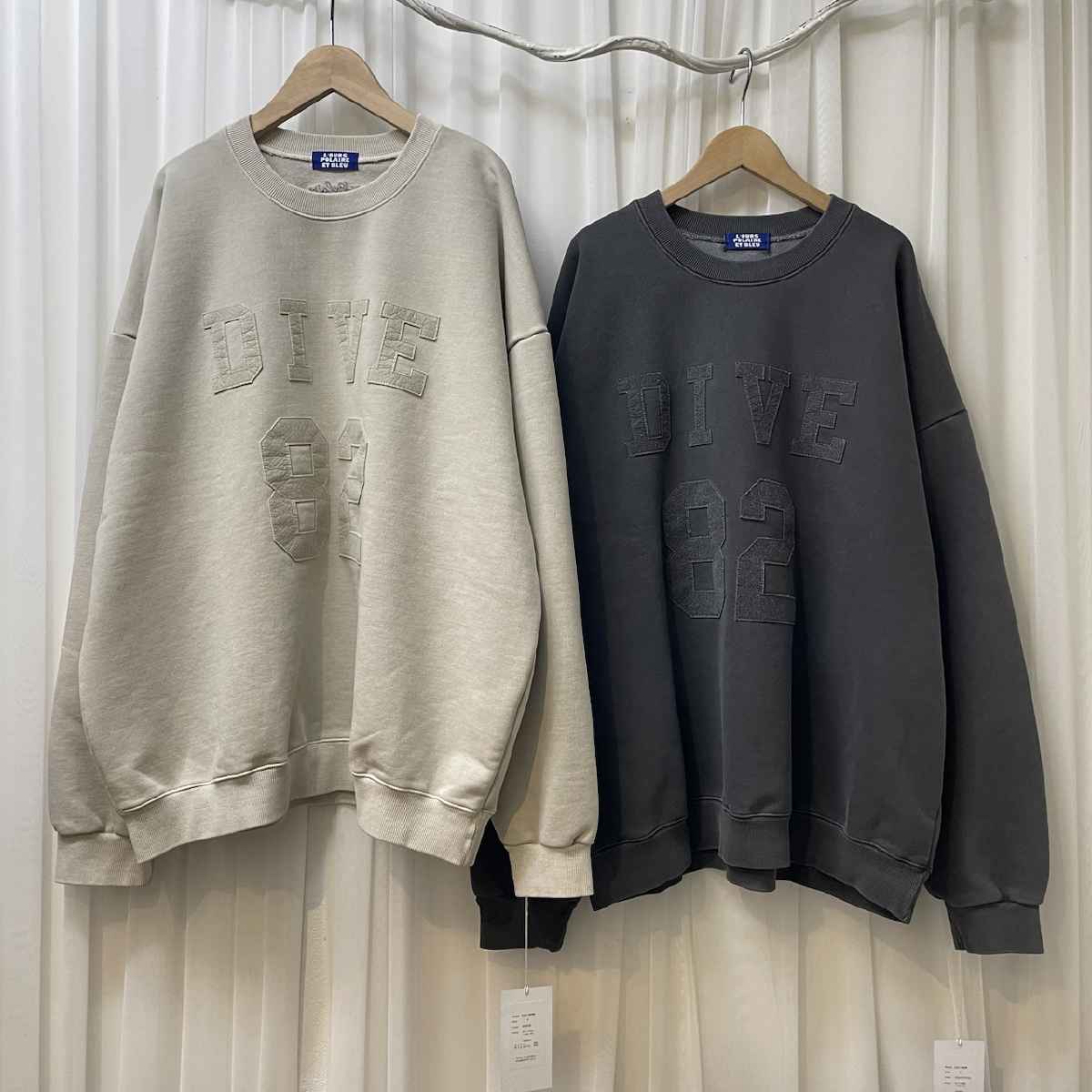 [ L’OURS POLAIRE ET BLEU / ルスポレール＆ブリュ ] ワッペンロゴ長袖トレーナー